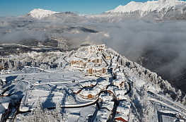 It is located in the Olympic Mountain Village at an altitude of 1100 m